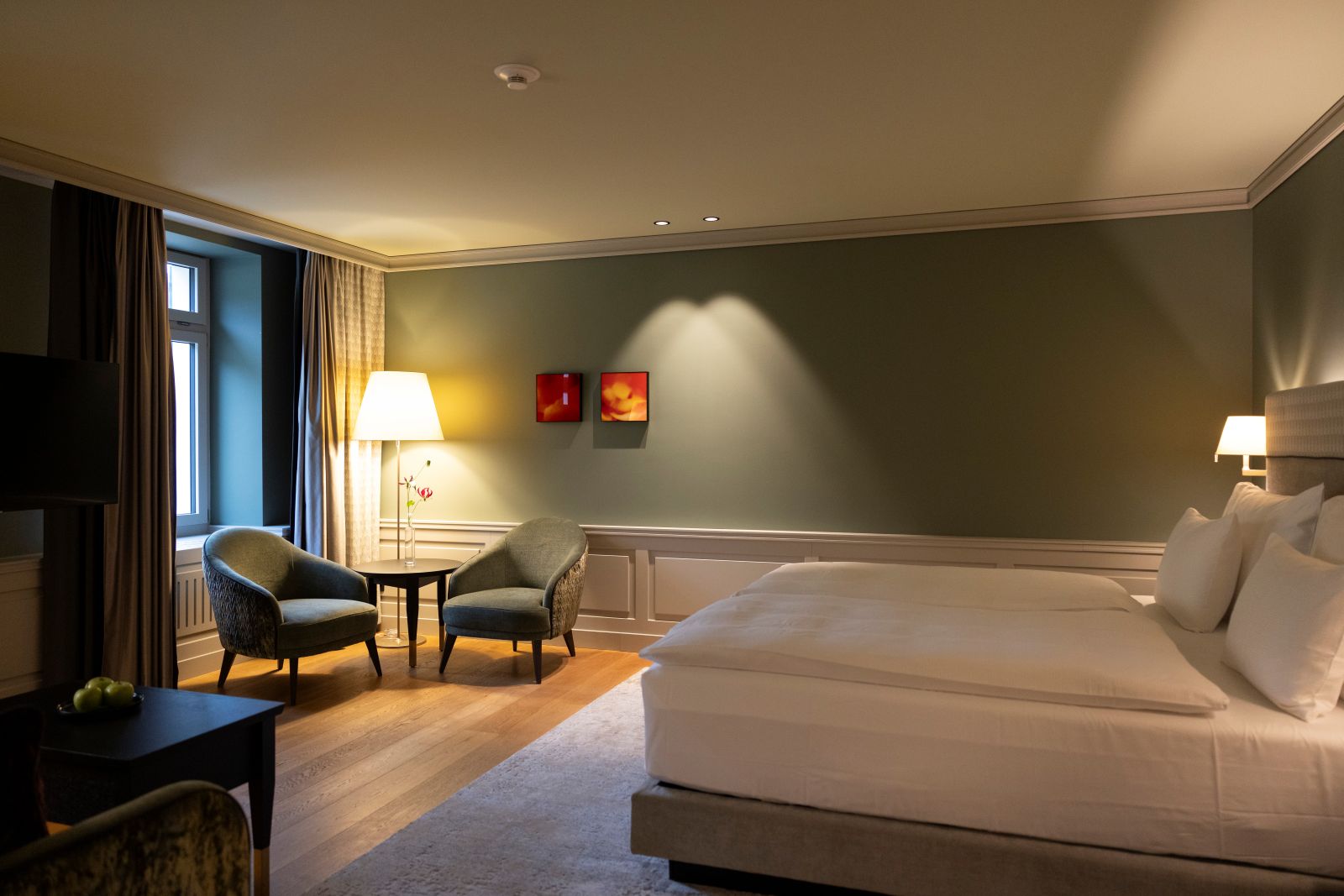 Hotel Cresta Palace, St Moritz - green double room with comfortable armchairs